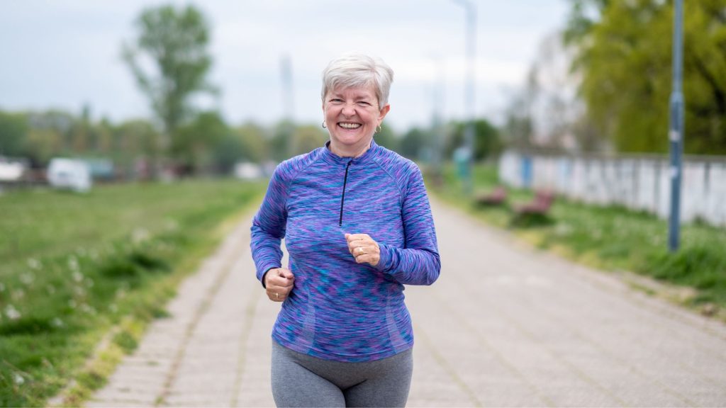 photo that shows and eldery lady jogging